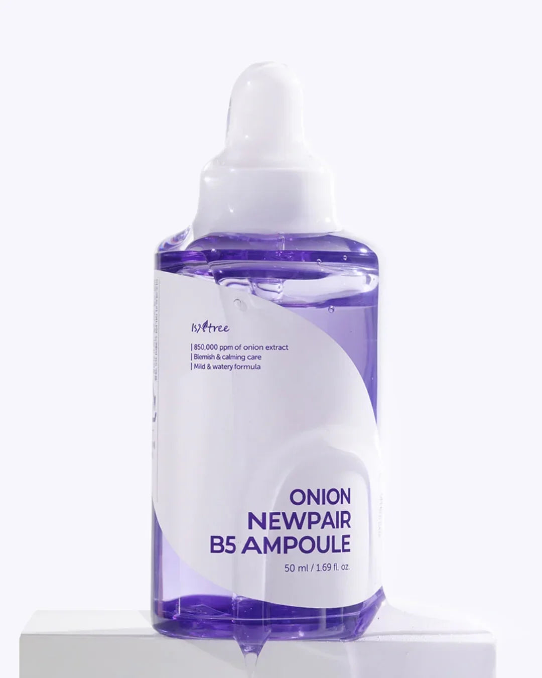 Isntree Onion Newpair B5 Ampoule skincare product bottle with purple liquid, dropper cap