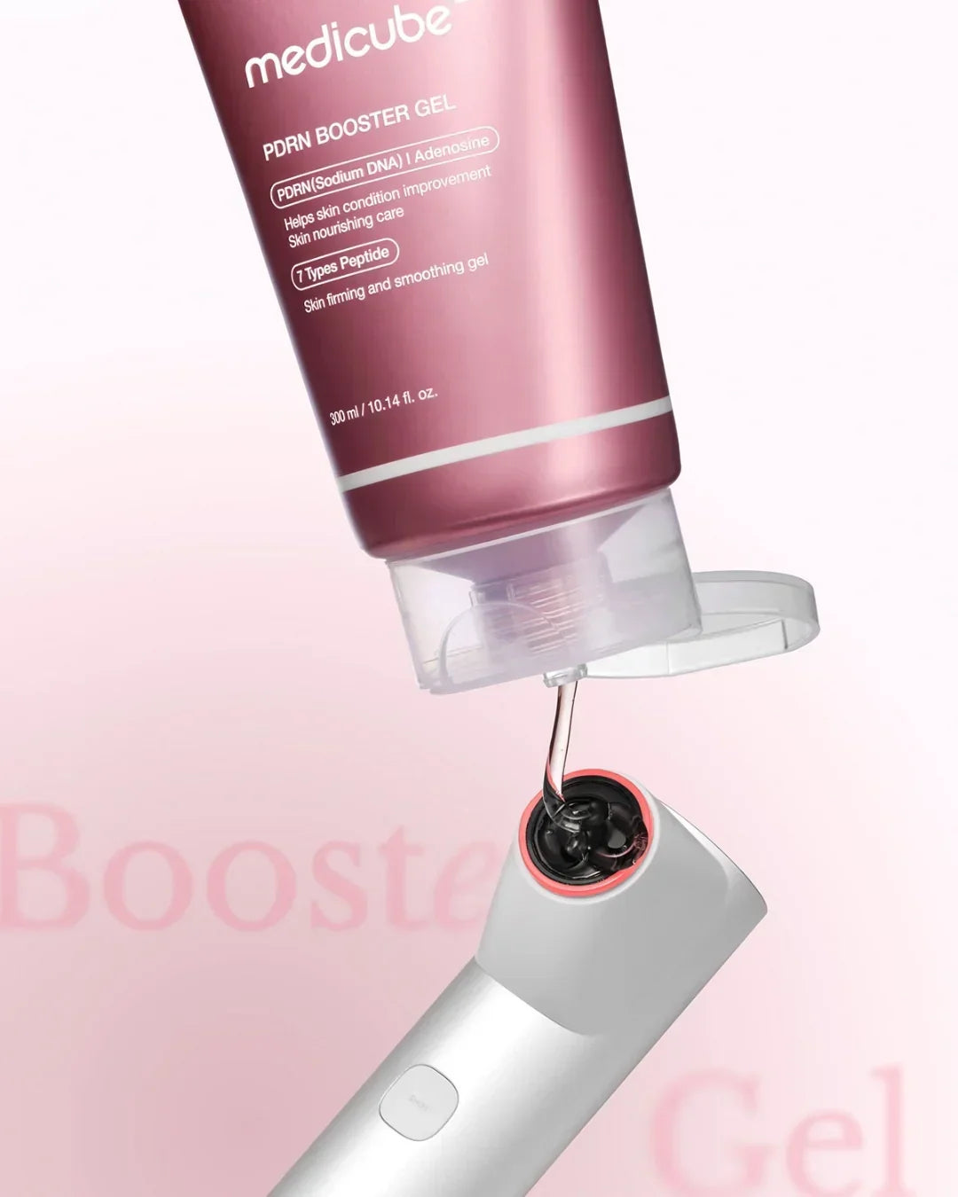 Medicube PDRN Booster Gel being dispensed into a white skincare device against a soft pink background