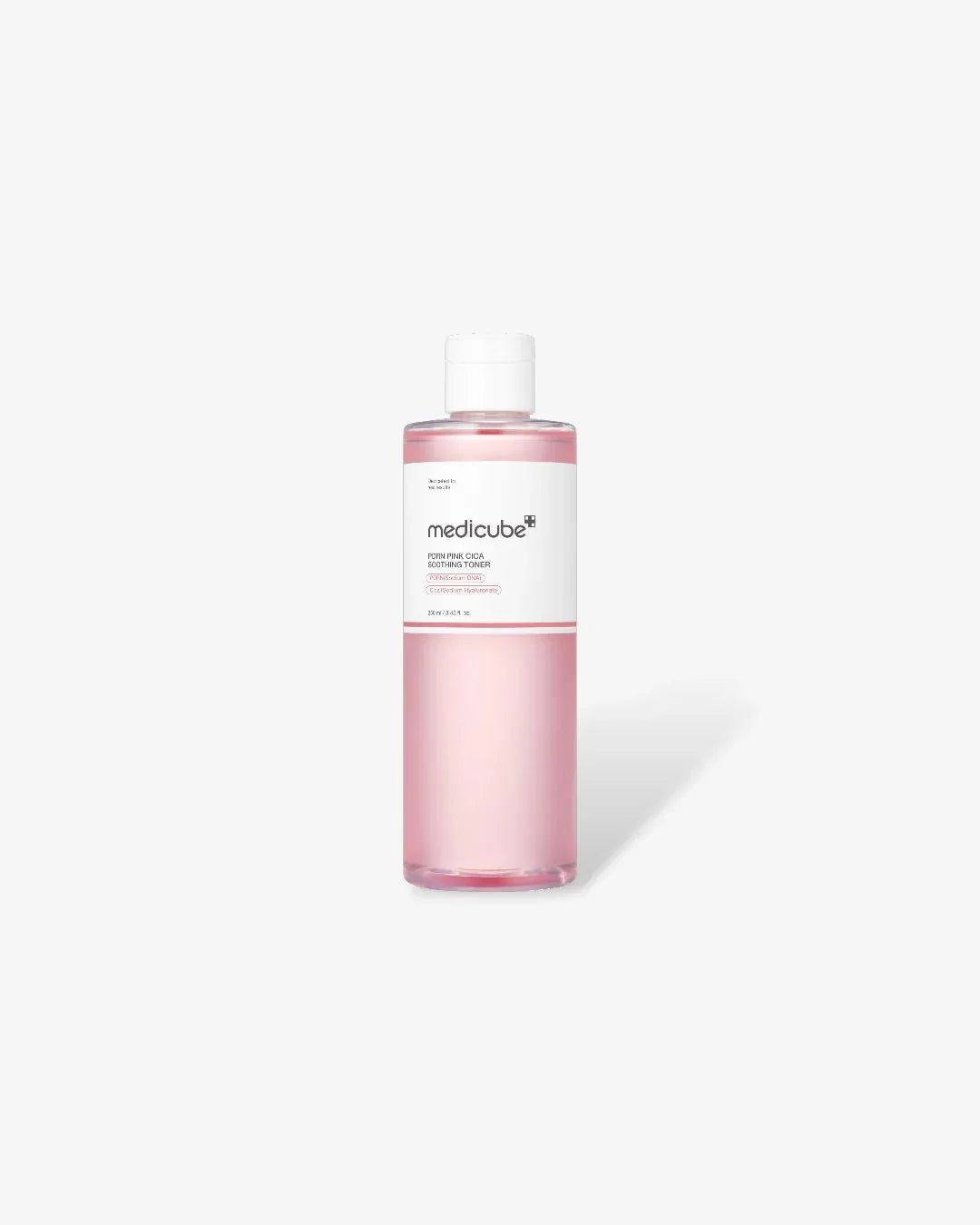 Medicube PDRN Pink Cica Soothing Toner 250ml bottle with pink liquid on white background