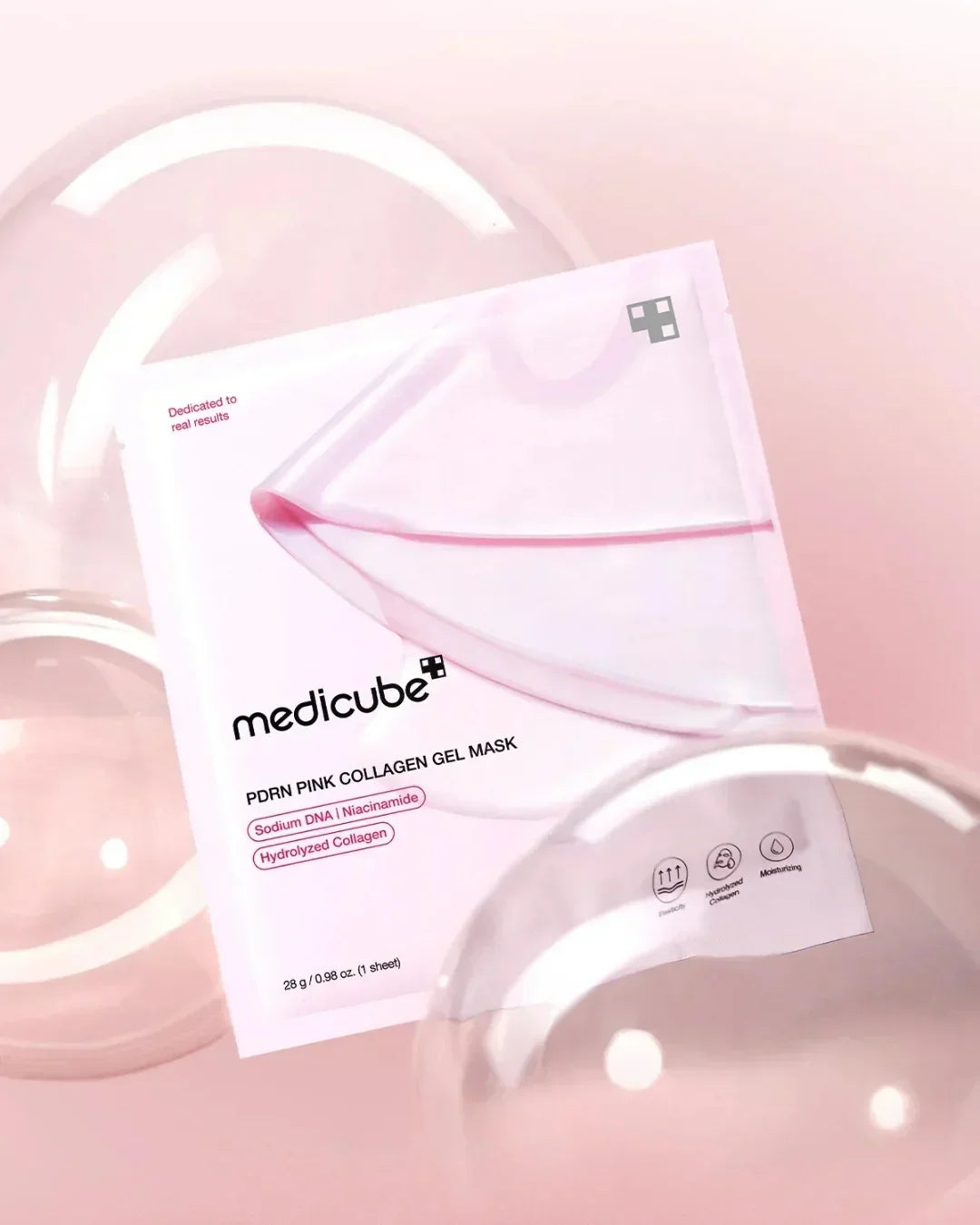 Medicube PDRN Pink Collagen Gel Mask packaging with translucent pink gel sheet on pastel pink background
