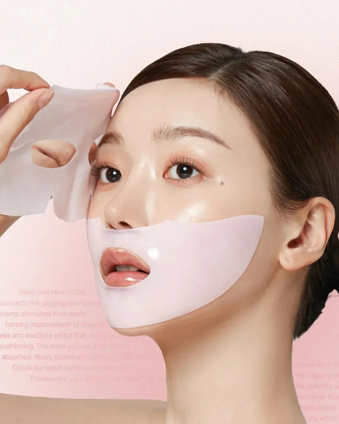 Woman applying pink collagen gel mask on lower face, smooth skin, skincare beauty treatment