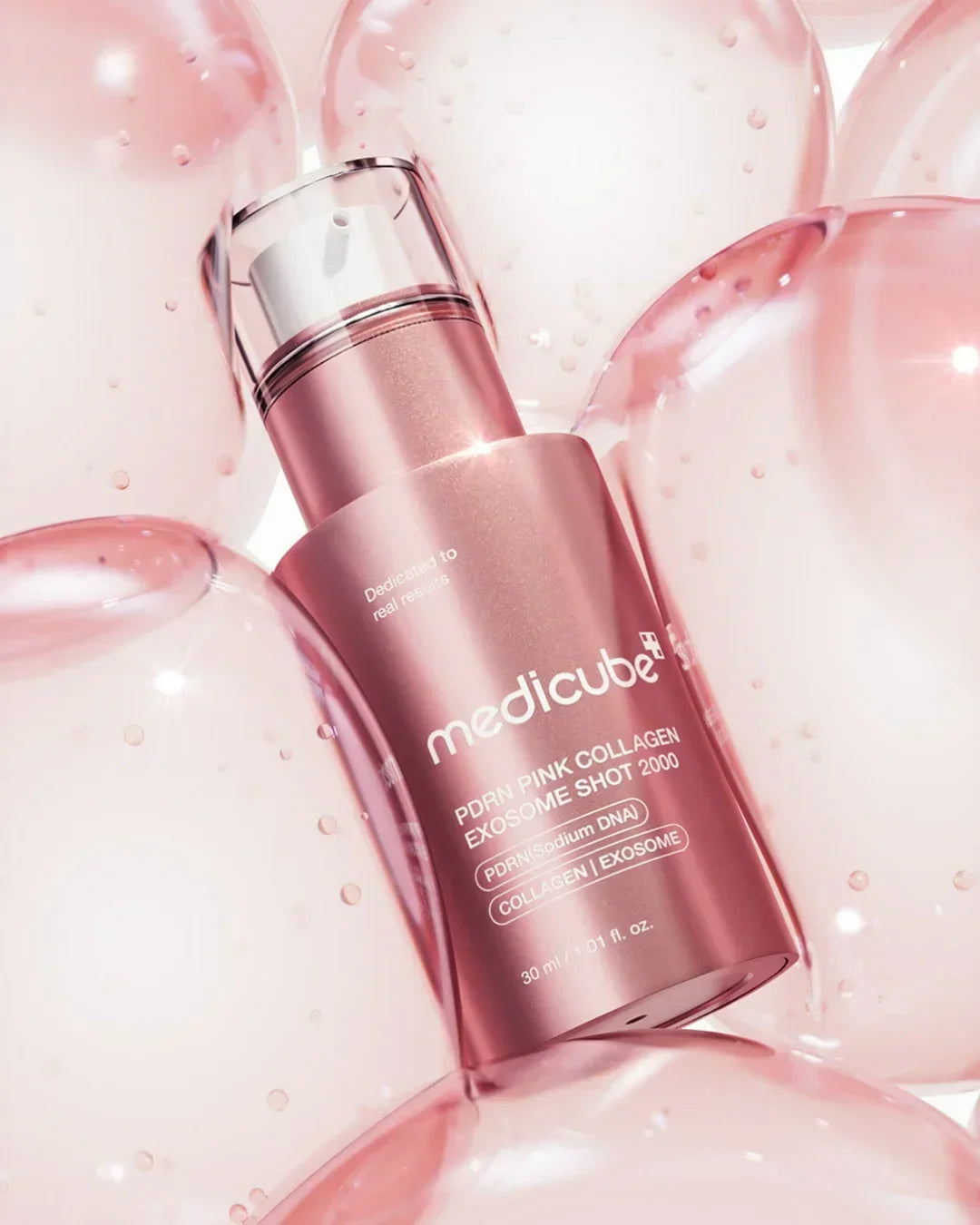 Medicube PDRN Pink Collagen Exosome Shot serum 30ml bottle on pink bubble backdrop, Korean skincare on Malkn