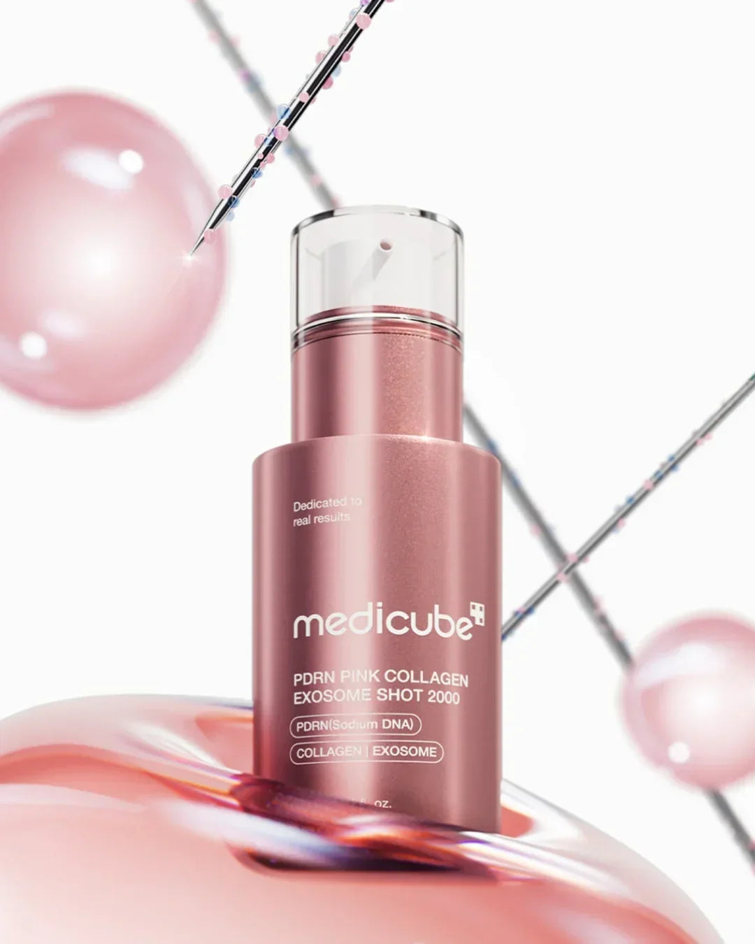 MedikCube PDRN Pink Collagen Exosome Shot 2000 serum bottle with pink serum bubbles, Korean beauty skincare