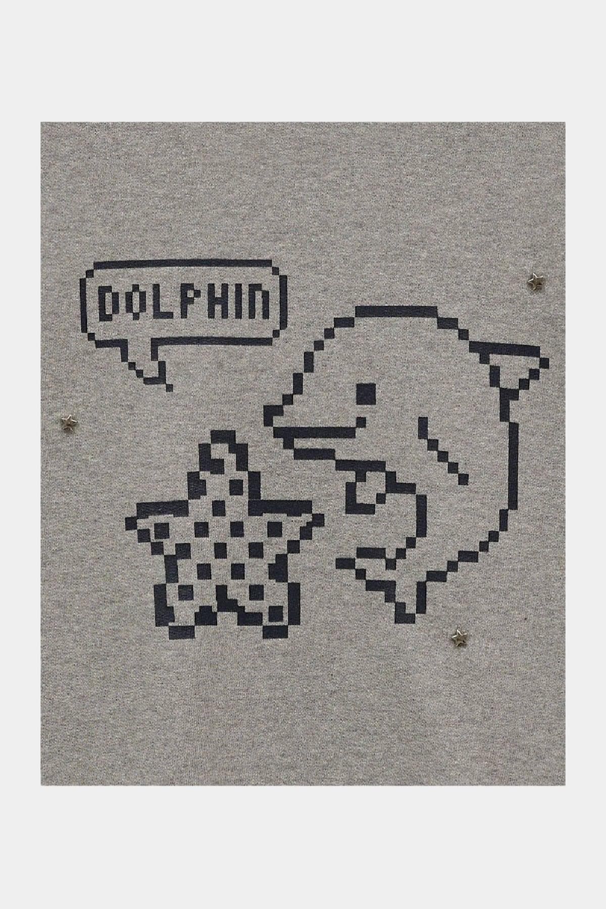 Grey fabric with pixel art dolphin, pixel starfish, and speech bubble saying 'DOLPHIN'