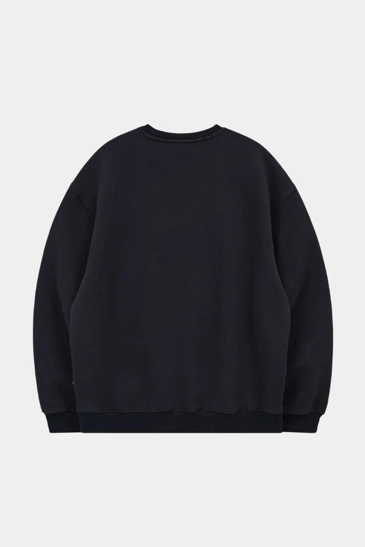 Back view of navy blue sweatshirt with long sleeves and ribbed cuffs and hem