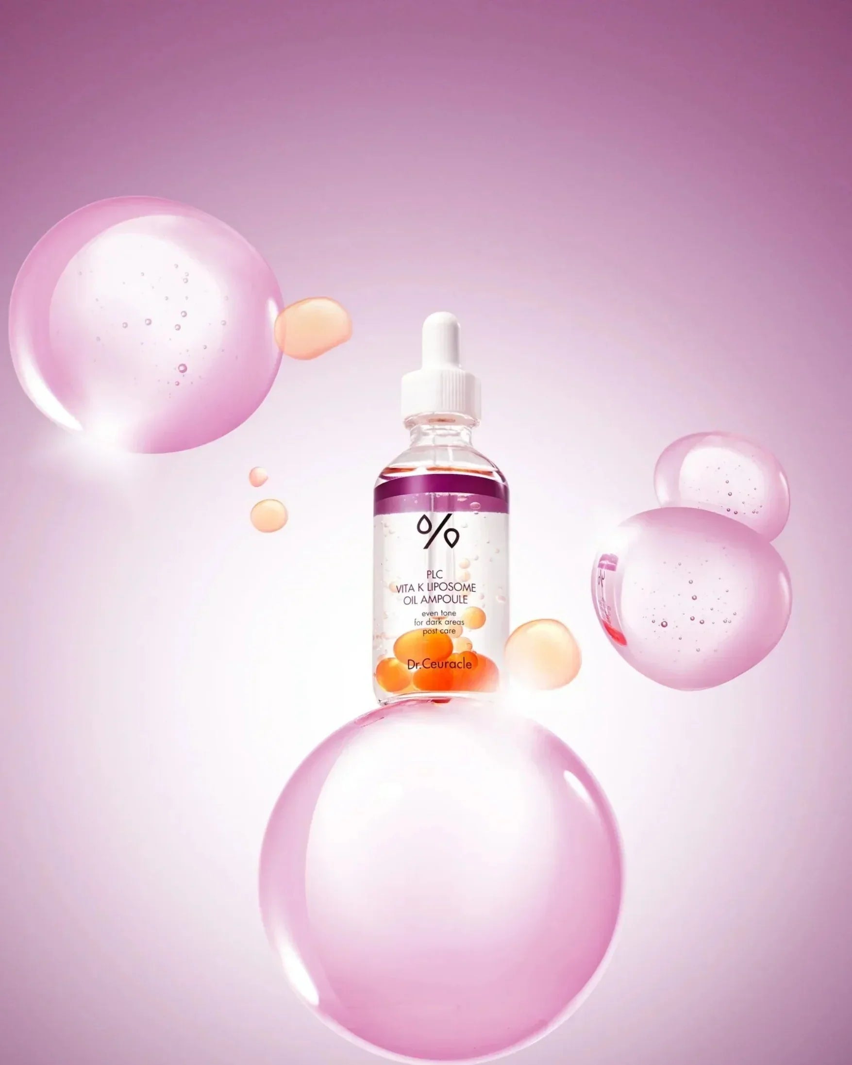 Dr.Ceuracle PLC Vita K Liposome Oil Ampoule bottle with orange capsules, pink bubbles background