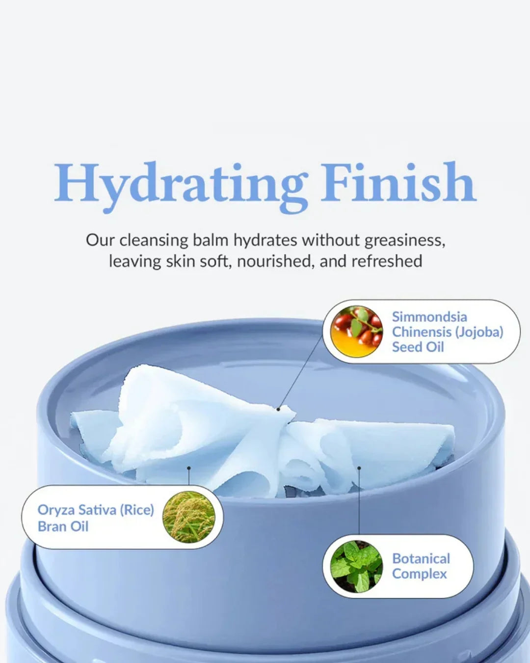 Blue cleansing balm container with soft white balm curls highlighting jojoba seed oil, rice bran oil, and botanical complex