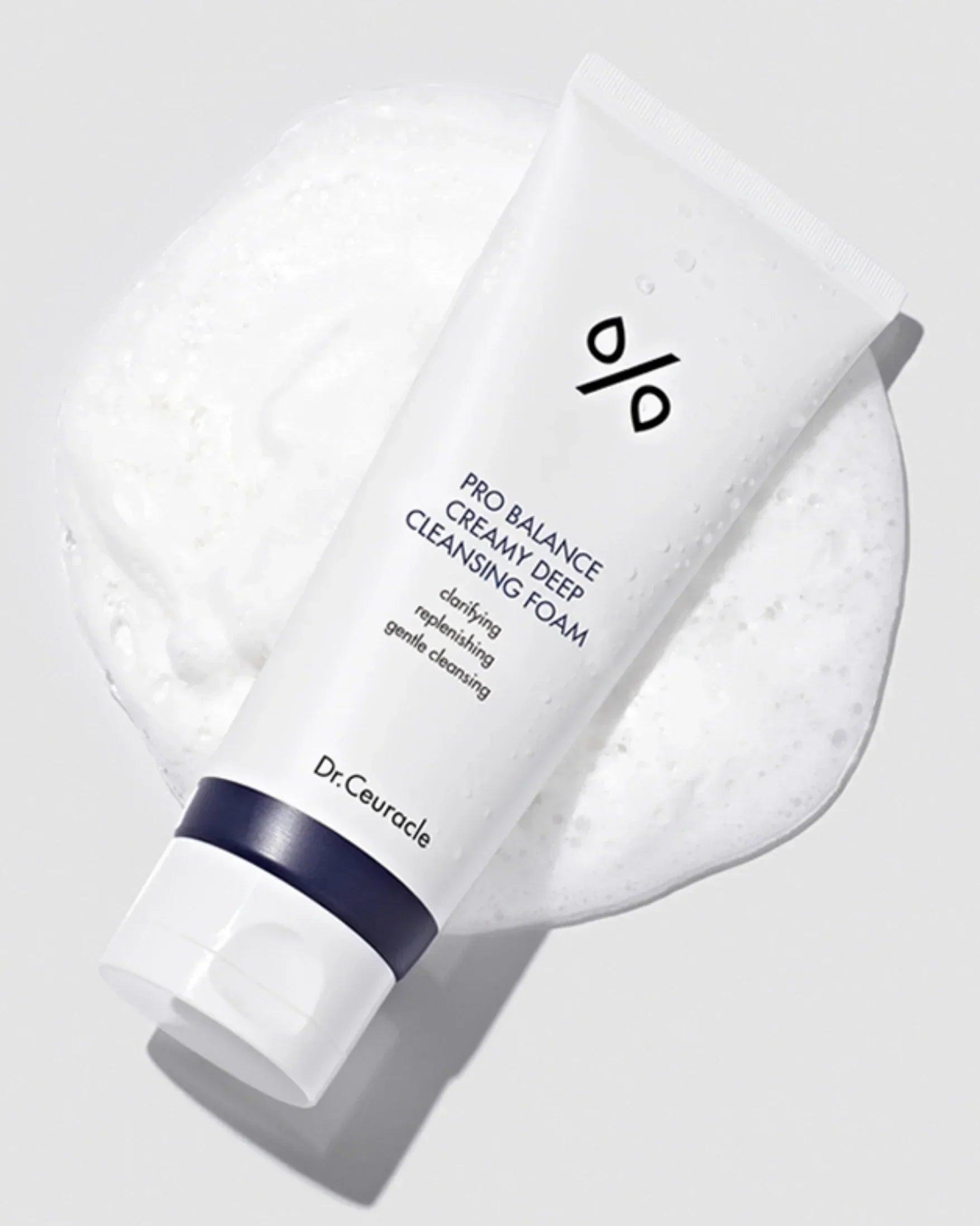 Dr. Ceuracle Pro Balance Creamy Deep Cleansing Foam tube on white foamy background