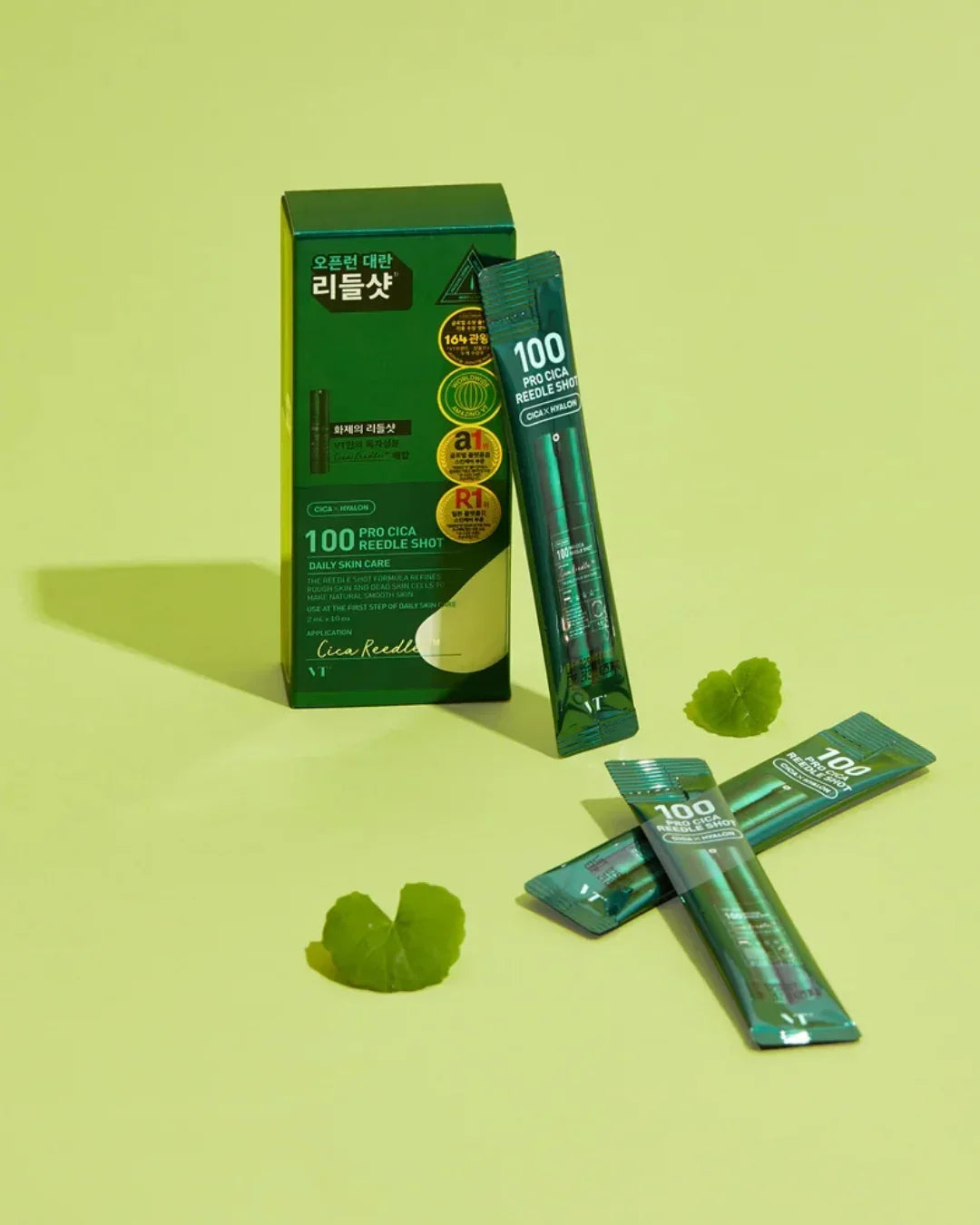 VT 100 Pro Cica Reedle Shot daily skincare ampoule sticks with green packaging and leaves