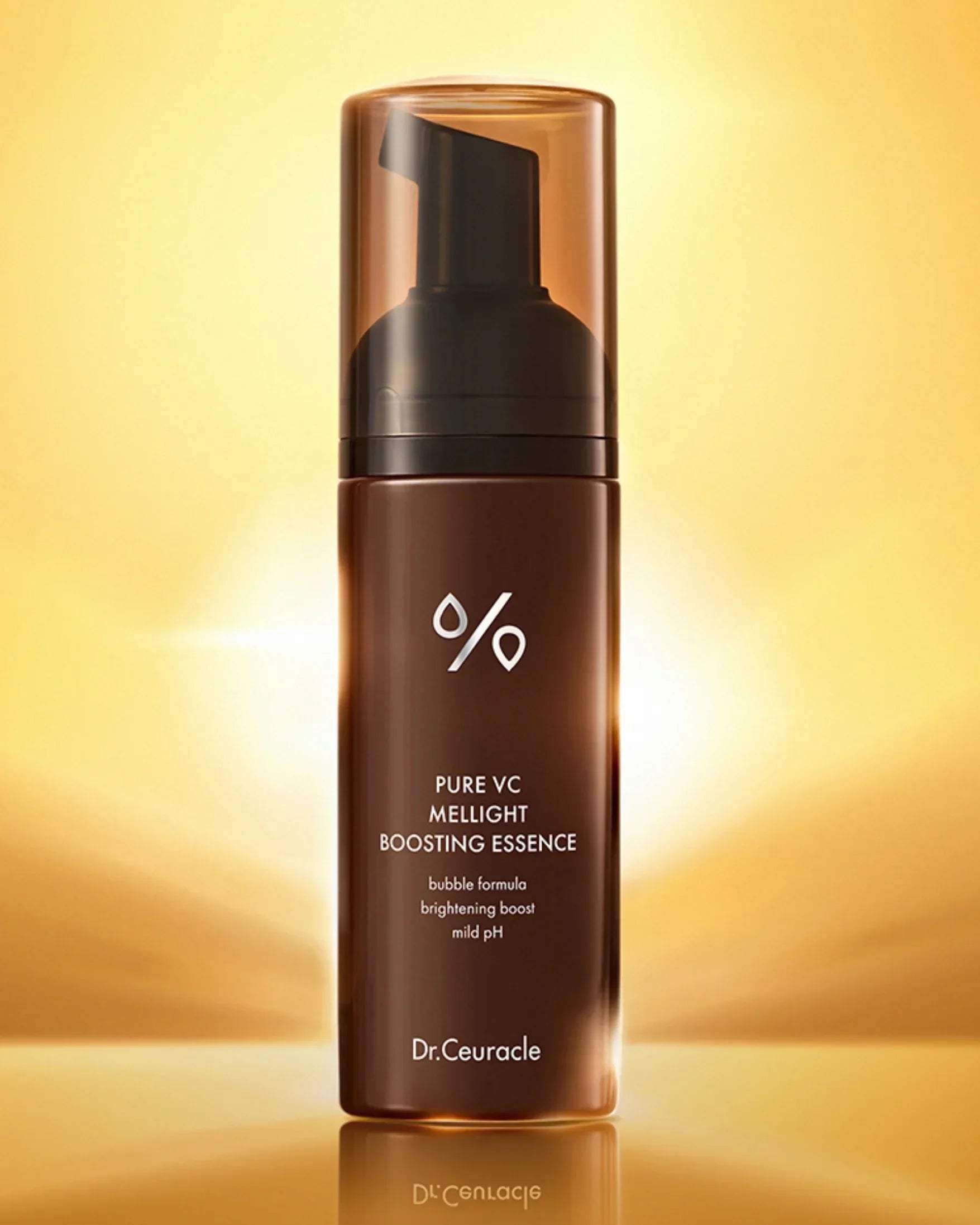 Dr.Ceuracle Pure VC Mellight Boosting Essence bottle with bubble formula on golden background