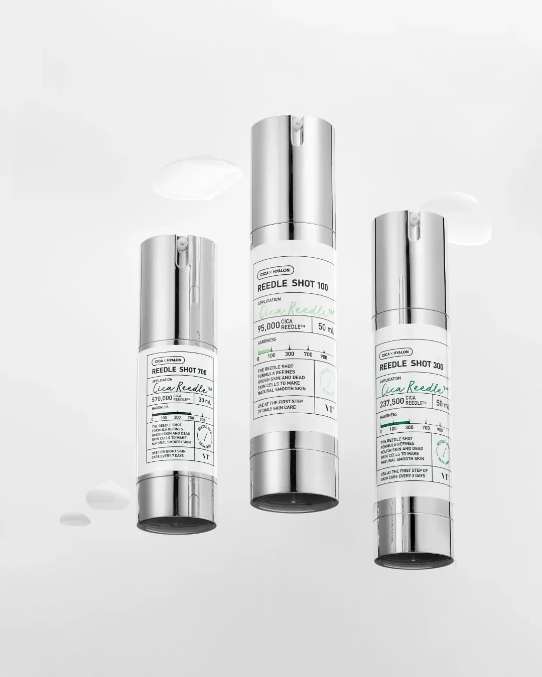 Three VT Cica Reeedle Shot skincare bottles with silver caps and white labels on light background