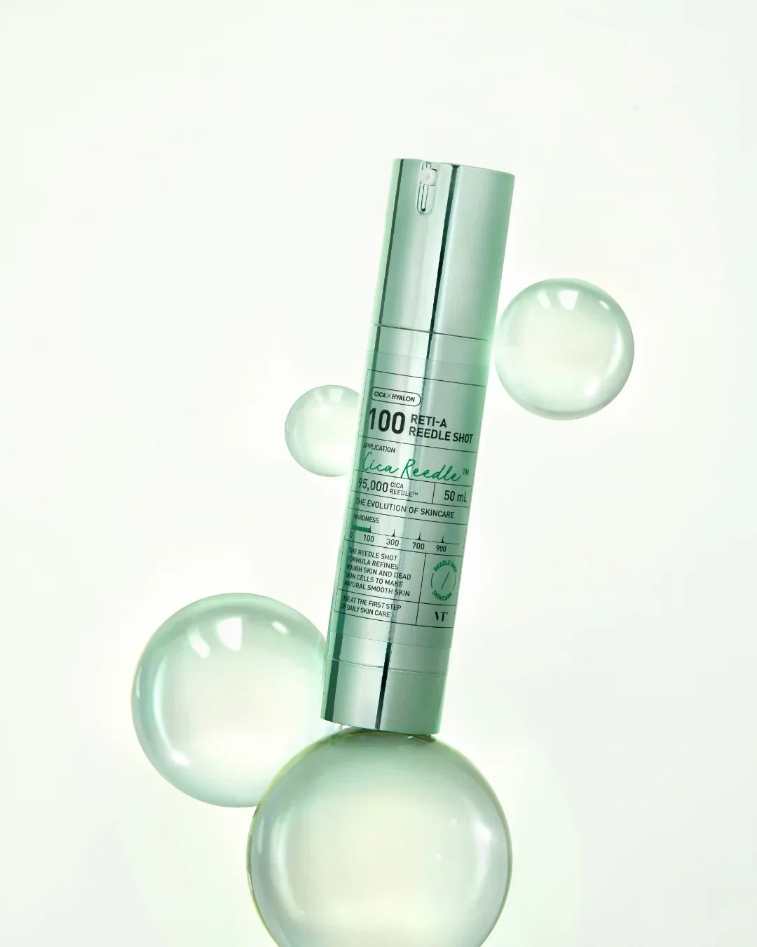 Silver bottle of VT Cica Needle 100 Reti-A Reedle Shot serum with transparent bubbles