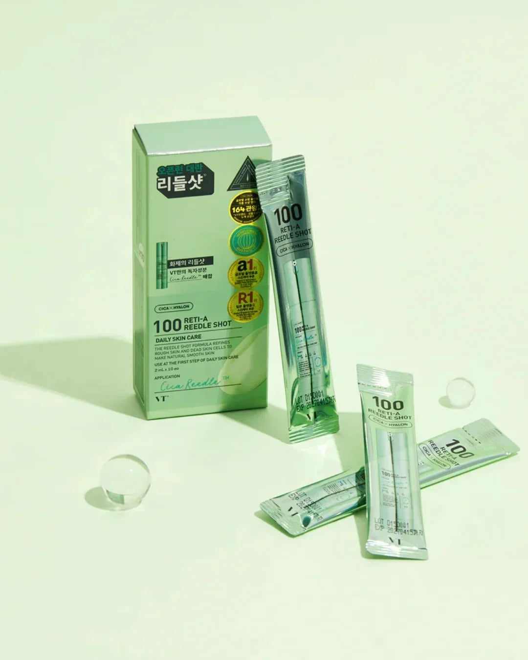 VT 100 Reti-A Reedle Shot daily skincare ampoules with green box packaging on light green background