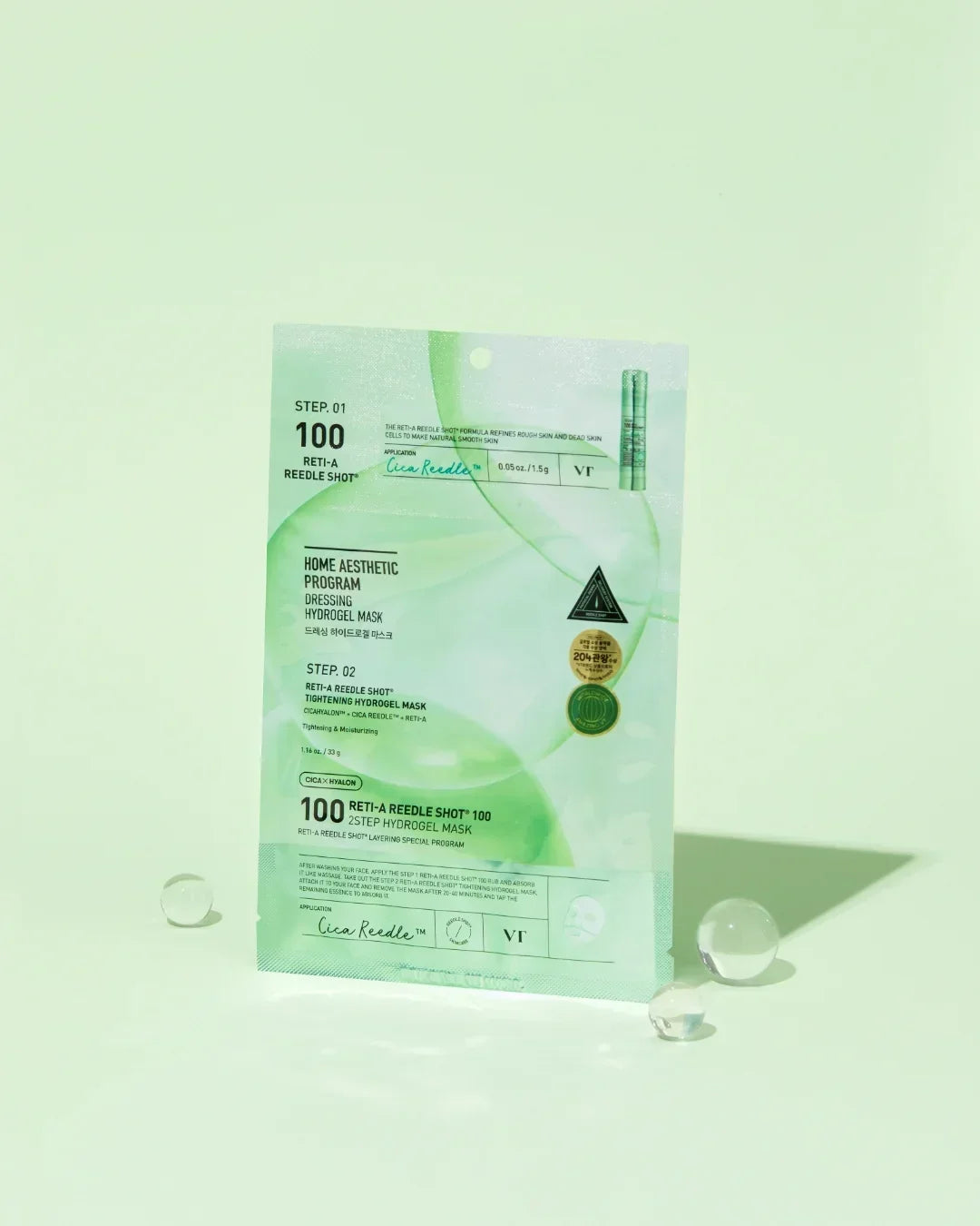 VT Cica Reedle Reti-A Reedle Shot 2-step Hydrogel Mask package on light green background with clear spheres