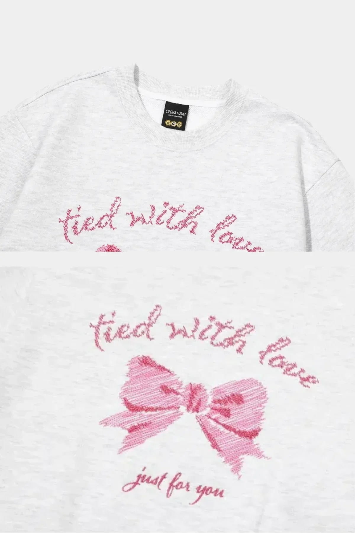 White melange sweatshirt with pink embroidered bow and text 'tied with love just for you'