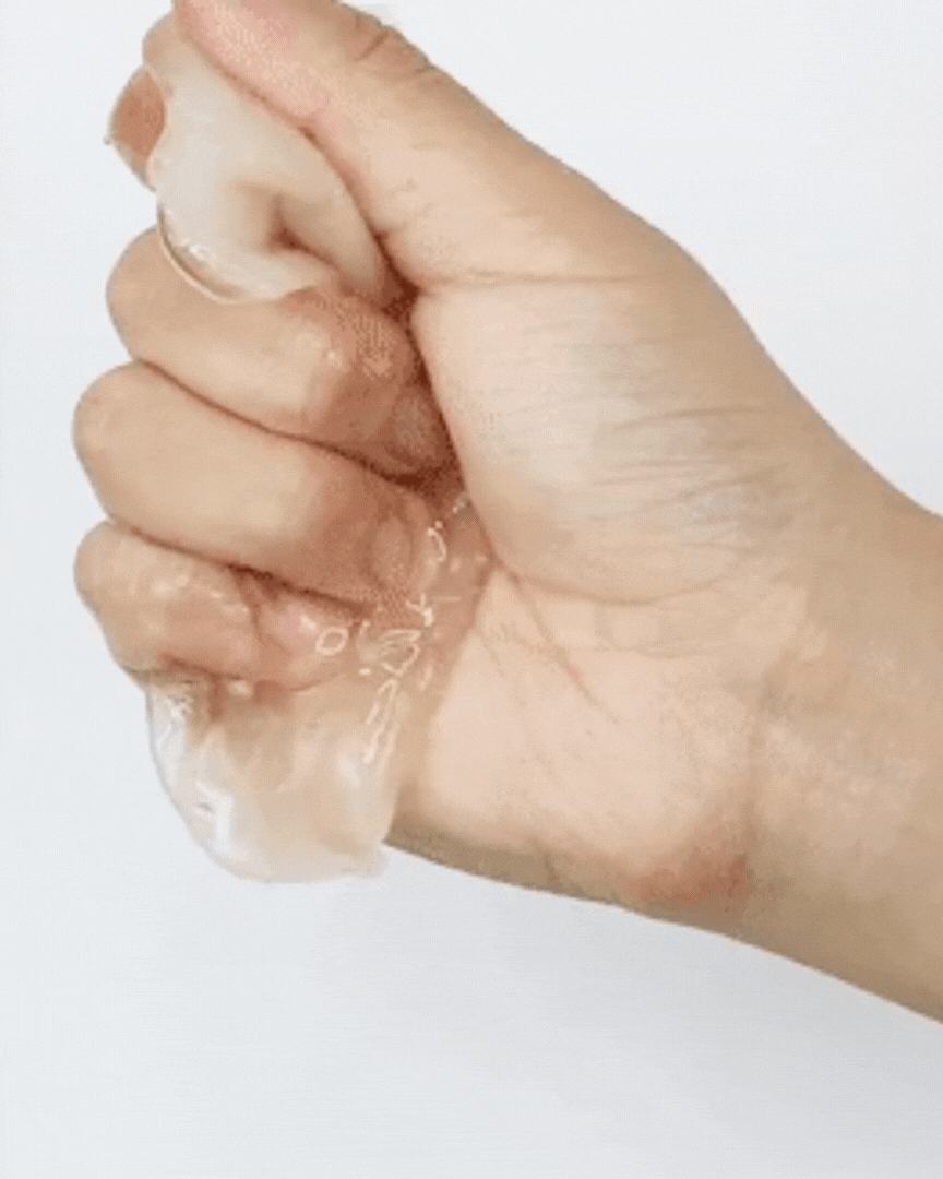 Hand squeezing clear Royal Vita Propolis Antioxidant Mask gel texture