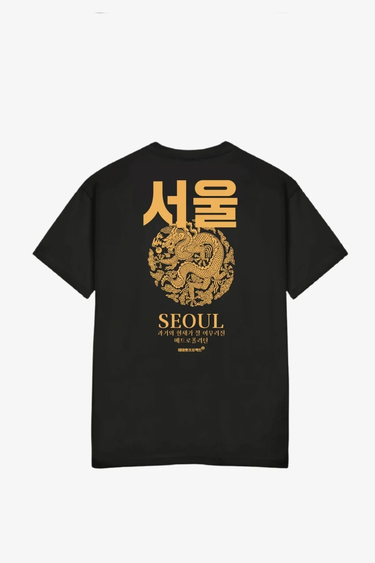 Black t-shirt with gold Seoul text and a circular dragon graphic design on the back