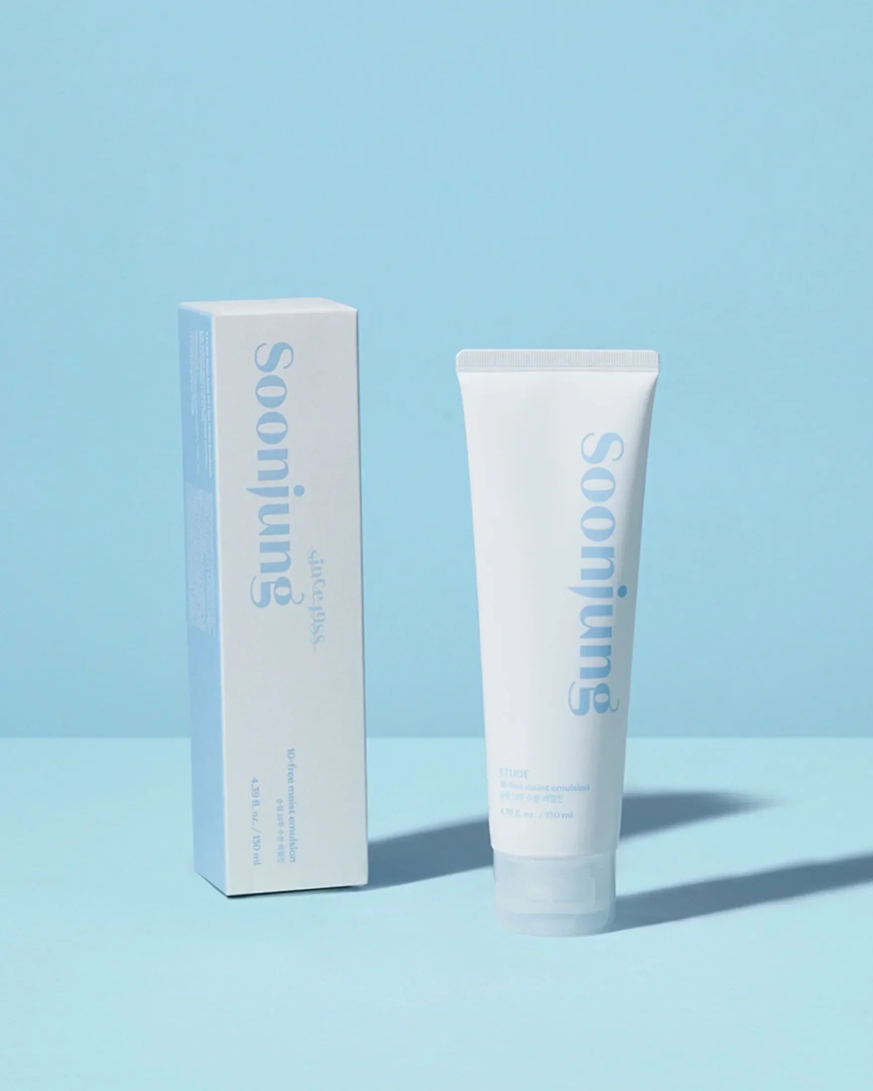 Soonjung 10-free moist emulsion skincare tube and box on blue background