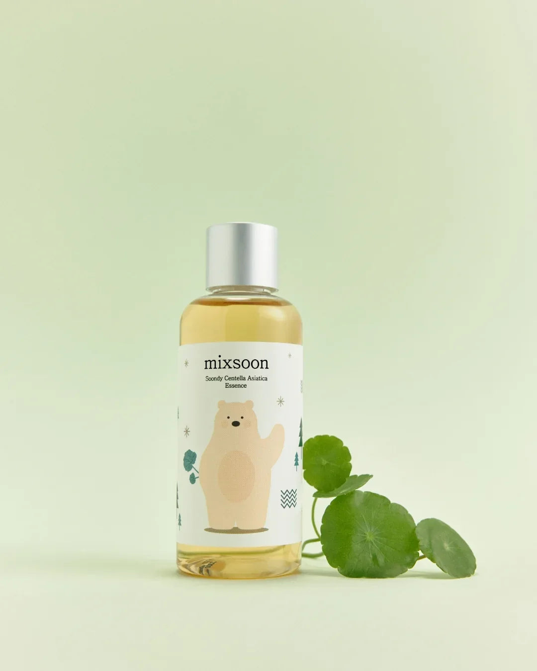 Mixsoon Soondy Centella Asiatica Essence bottle with bear illustration and green centella leaves on light green background