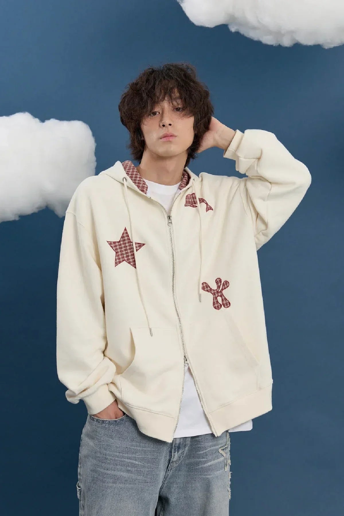 Model wears ivory zip-up hoodie with red star and dolphin appliqué, Korean fashion, Malkn UK.