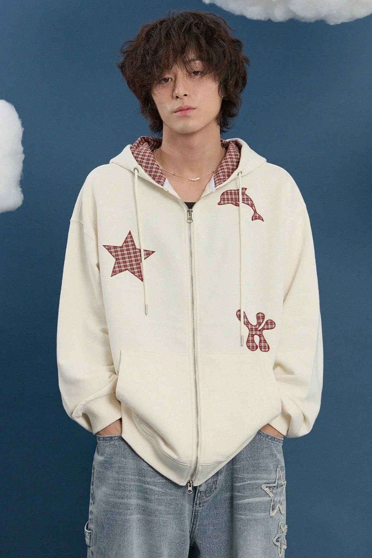 Model wearing ivory zip-up hoodie with plaid star, dolphin, and check patches, Korean fashion style