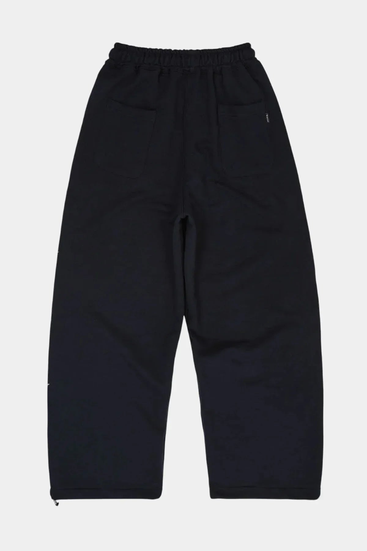 Back view of navy blue sweatpants with elastic waist and two back pockets on white background