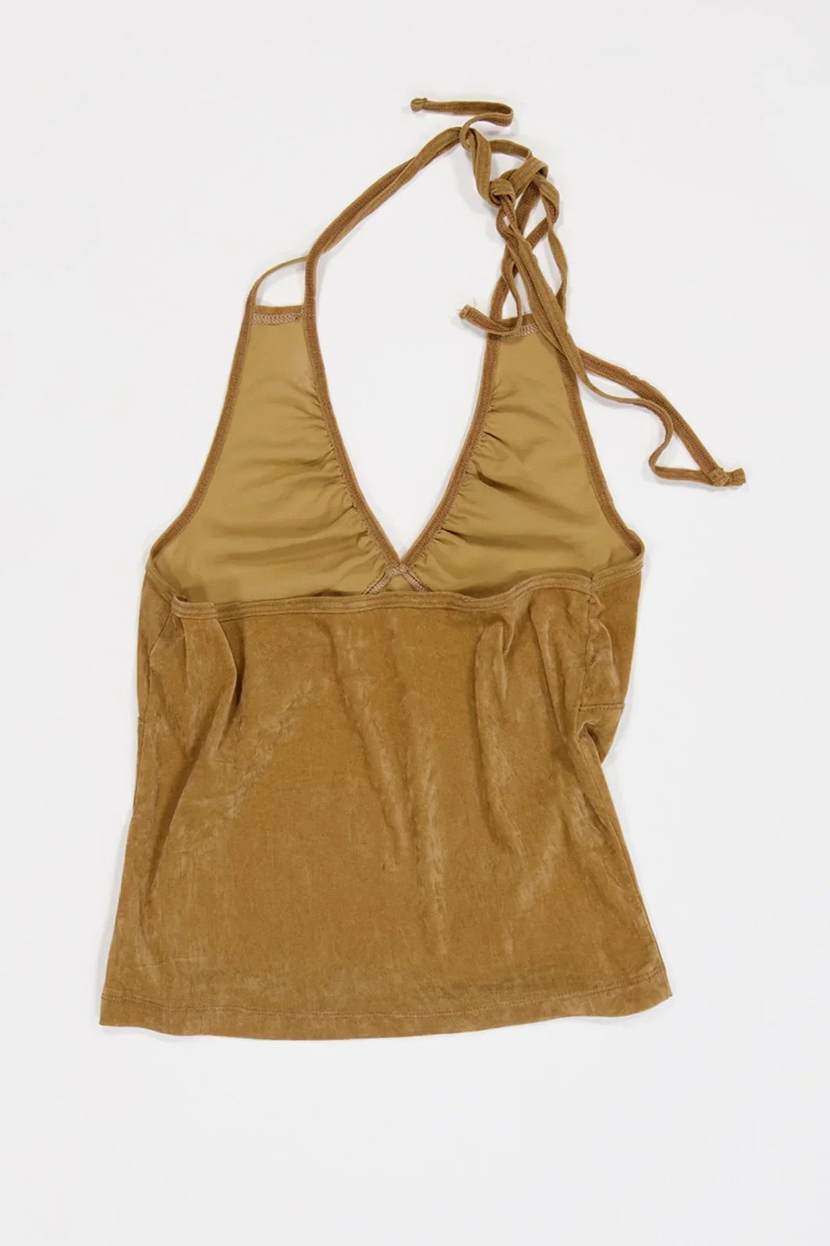 Camel-colored suede shirring bra top with halter neck straps on white background