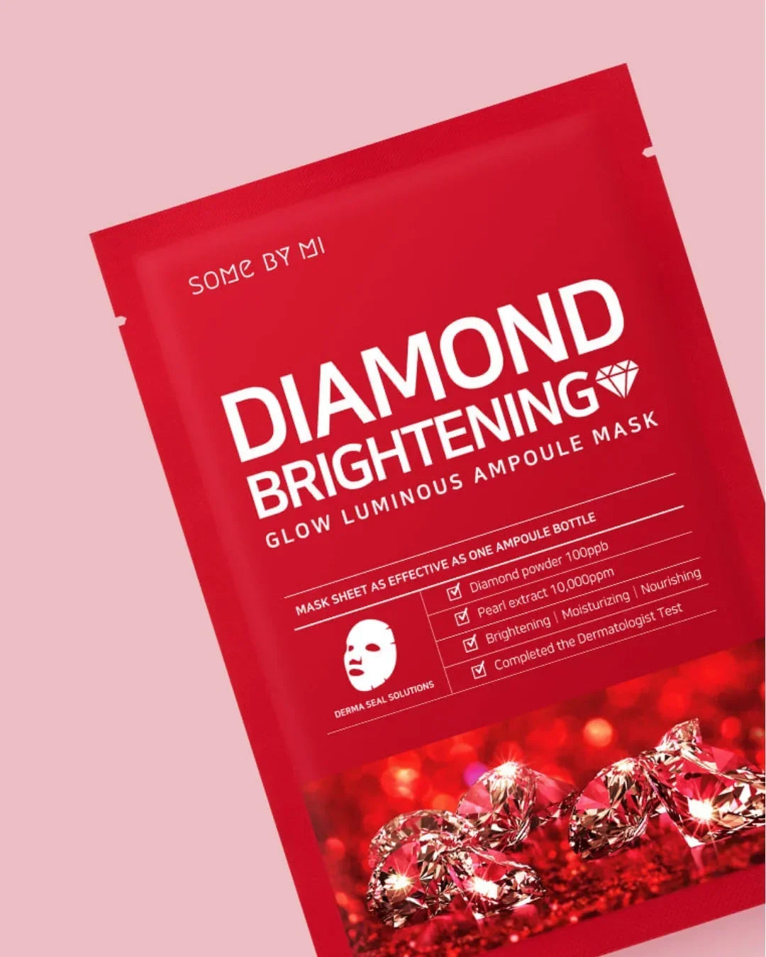 Red packaging of Diamond Brightening Glow Luminous Ampoule Mask with sparkling diamonds graphic