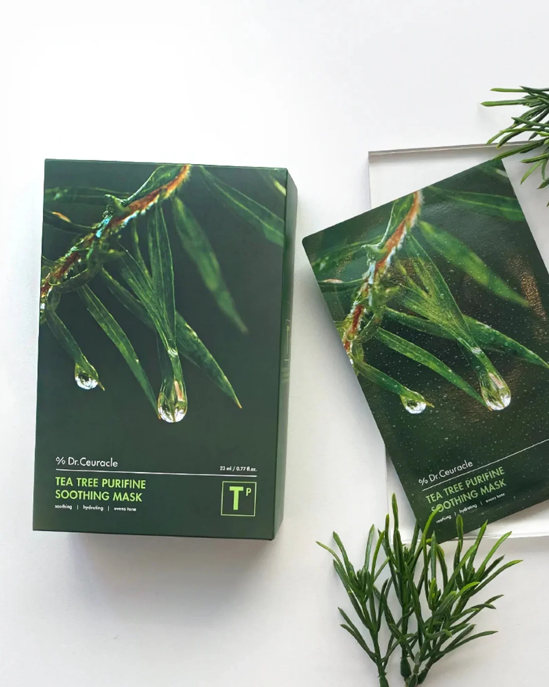 Dr.Ceuracle Tea Tree Purifine Soothing Mask box and sachet with tea tree leaves and water droplets