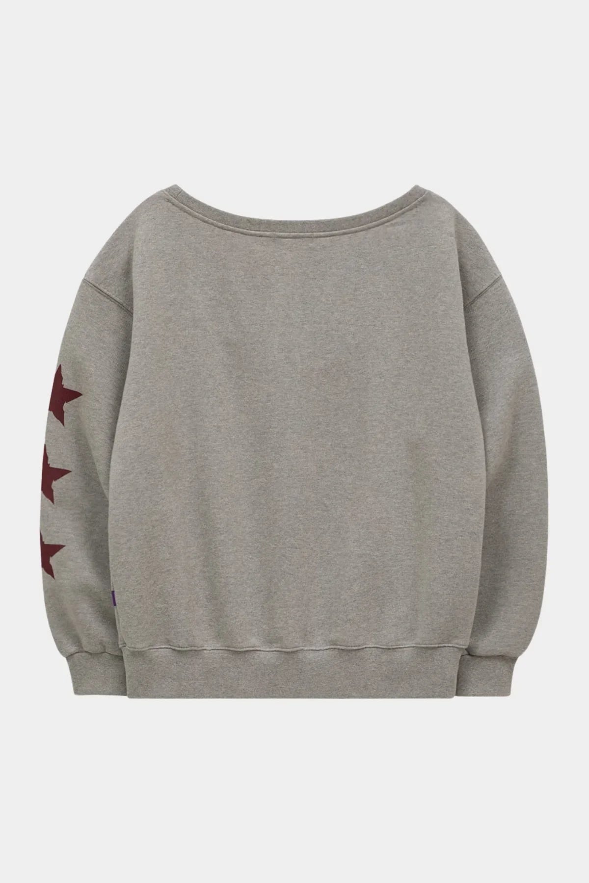 Grey off-shoulder sweatshirt with three maroon stars on left sleeve, back view