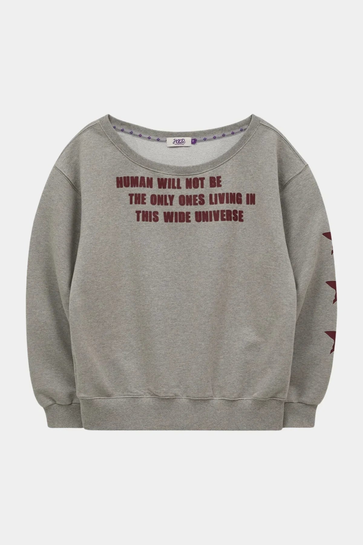 Grey off-shoulder sweatshirt with maroon text and star designs on sleeve, front view