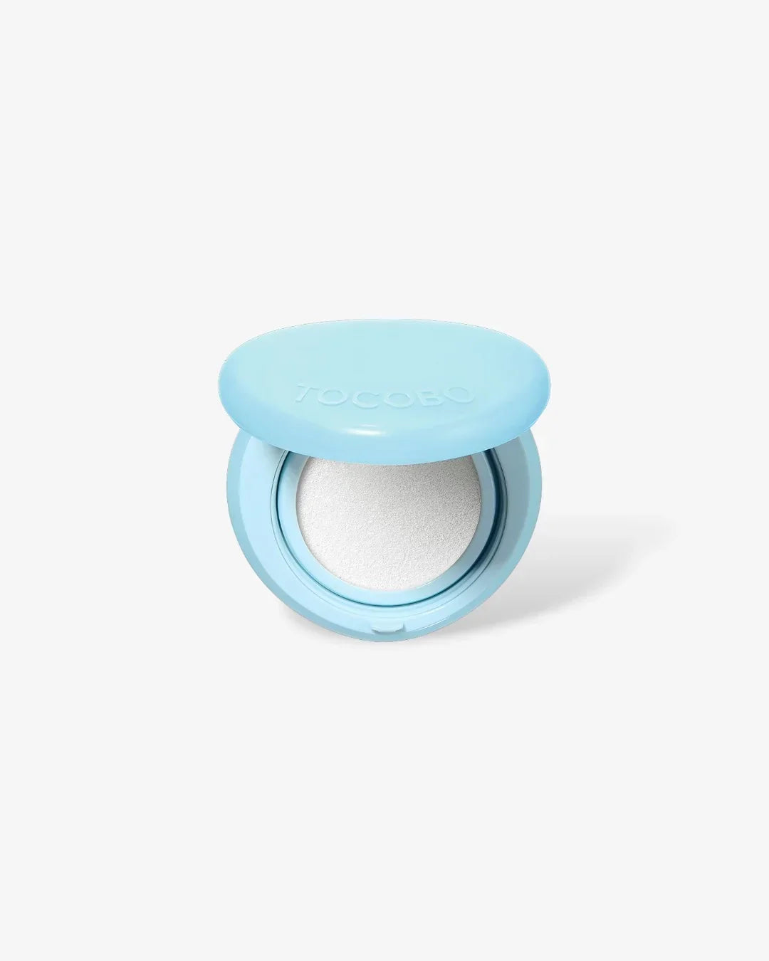Light blue TOCOBO open cushion compact with white makeup sponge on white background