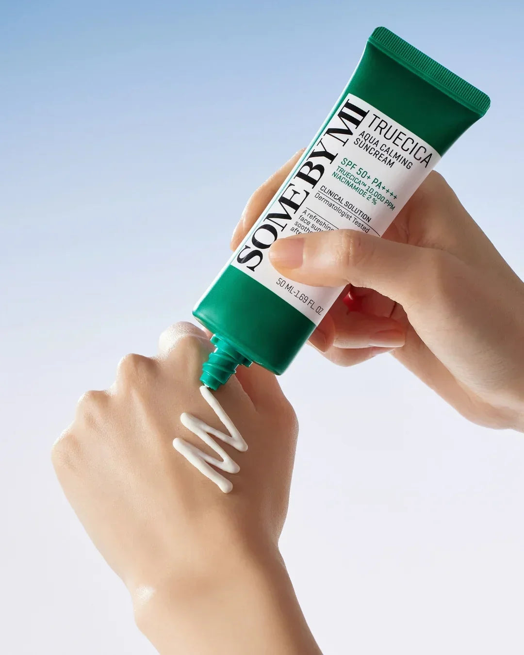 Person applying Some By Mi Truecica Aqua Calming Suncream SPF 50+ PA++++ on hand