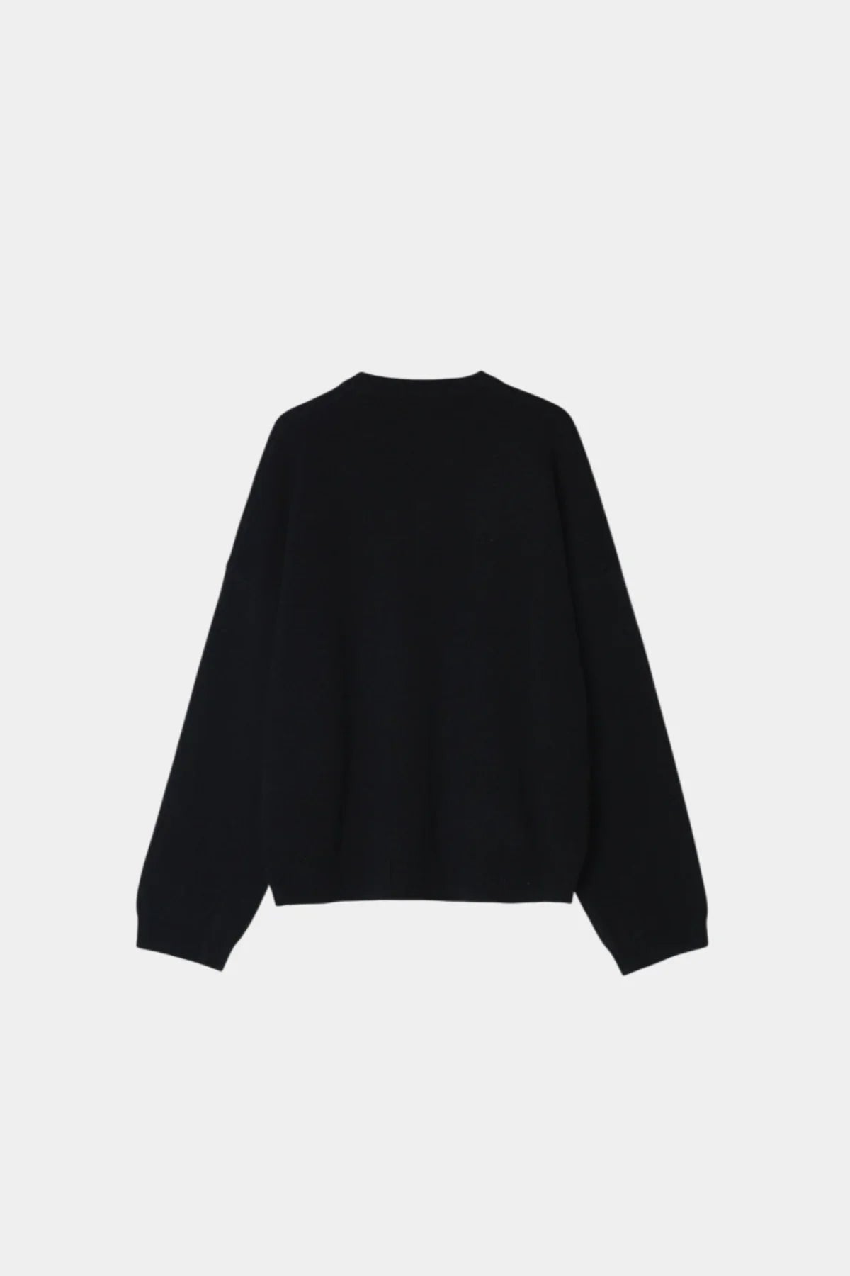Back view of a black unisex cashmere cardigan with long sleeves on white background