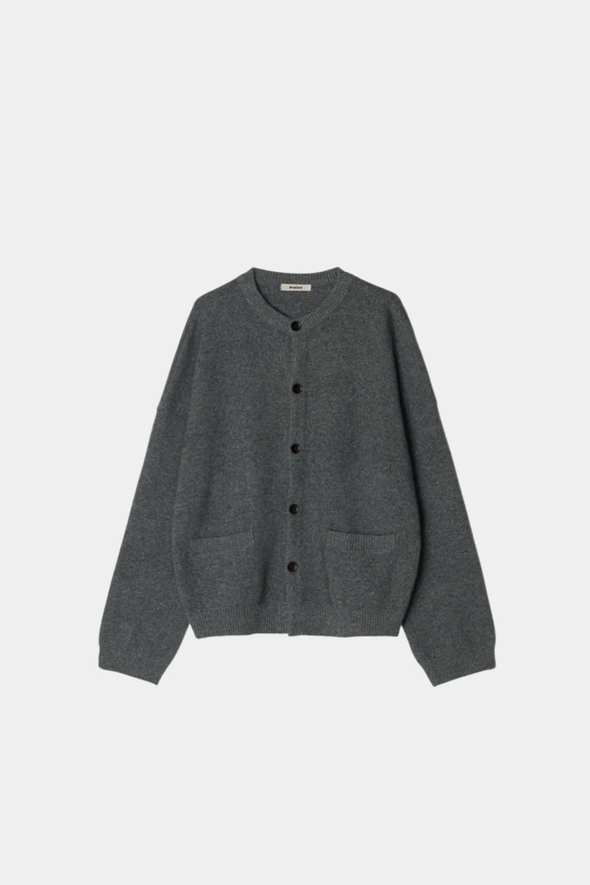 Unisex gray cashmere cardigan with buttons and two front pockets on white background
