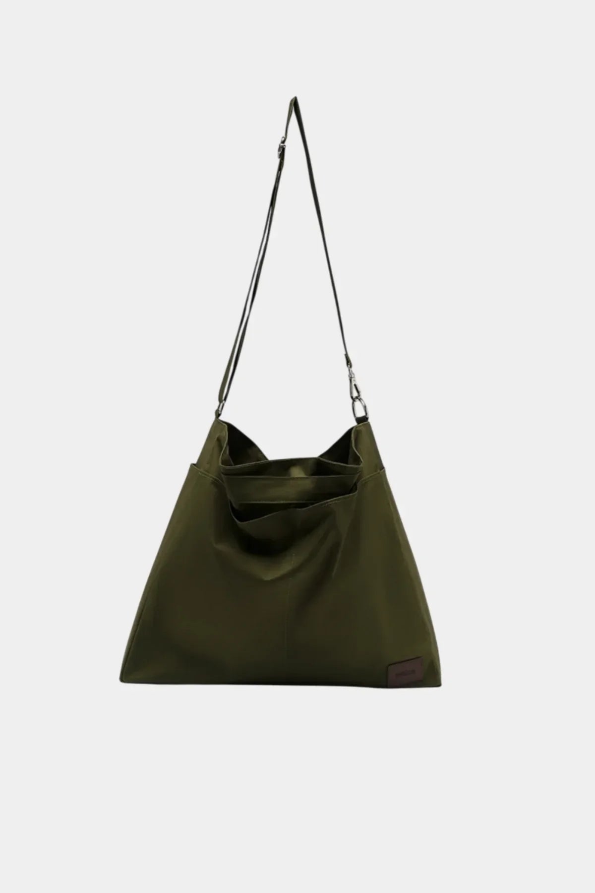 Khaki unisex shoulder bag with adjustable strap and front pocket, minimalist design
