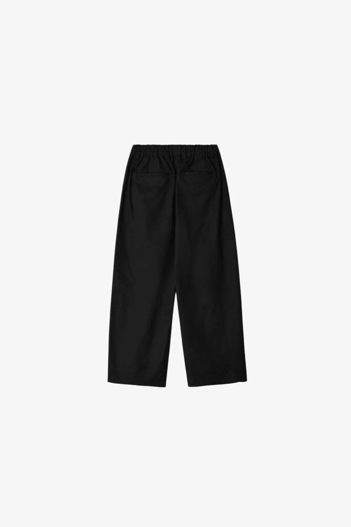 Back view of black unisex wide-leg pants with elastic waistband and two back pockets