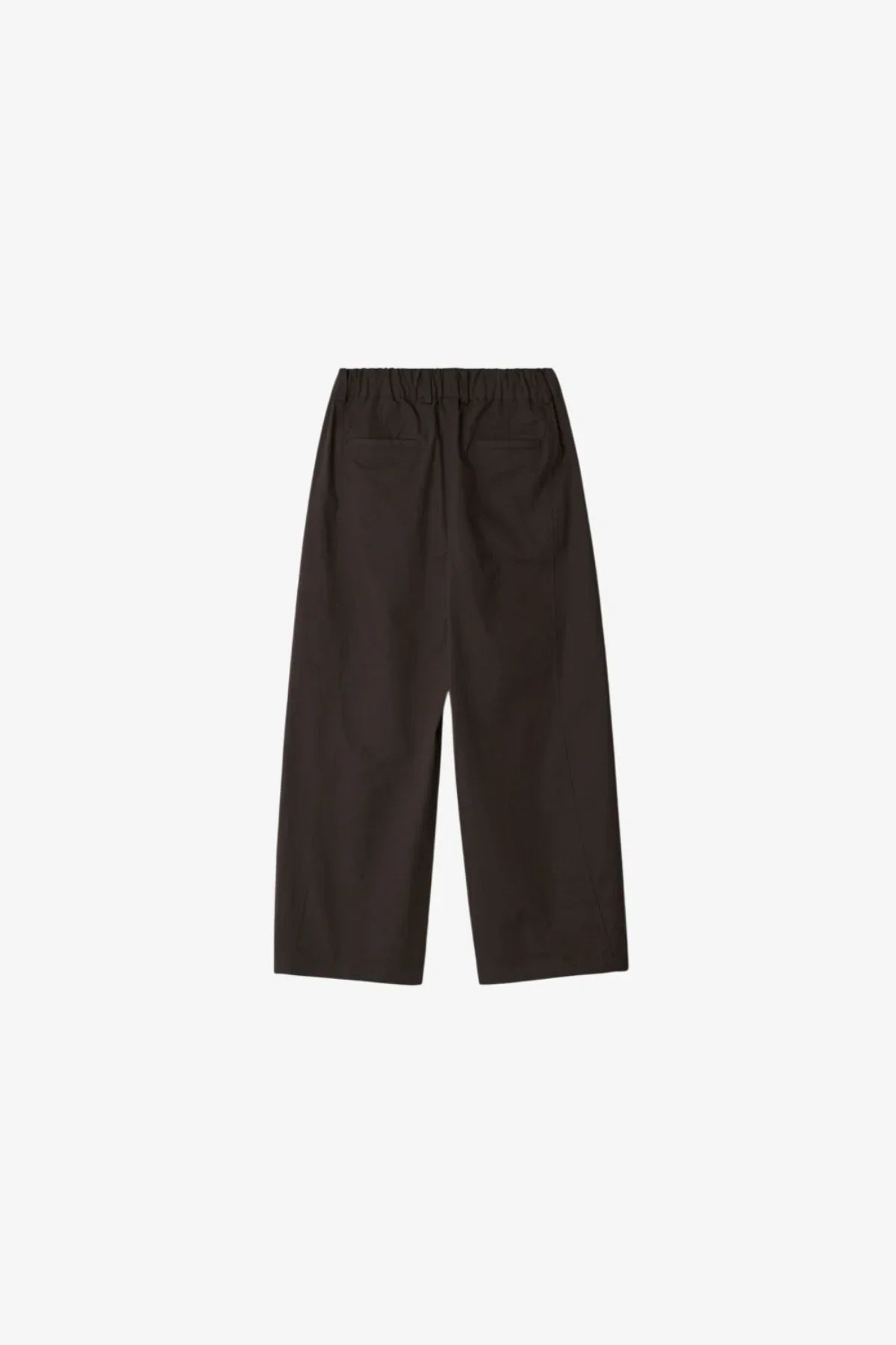 Back view of unisex brown side-slit cropped pants with elastic waistband and back pockets