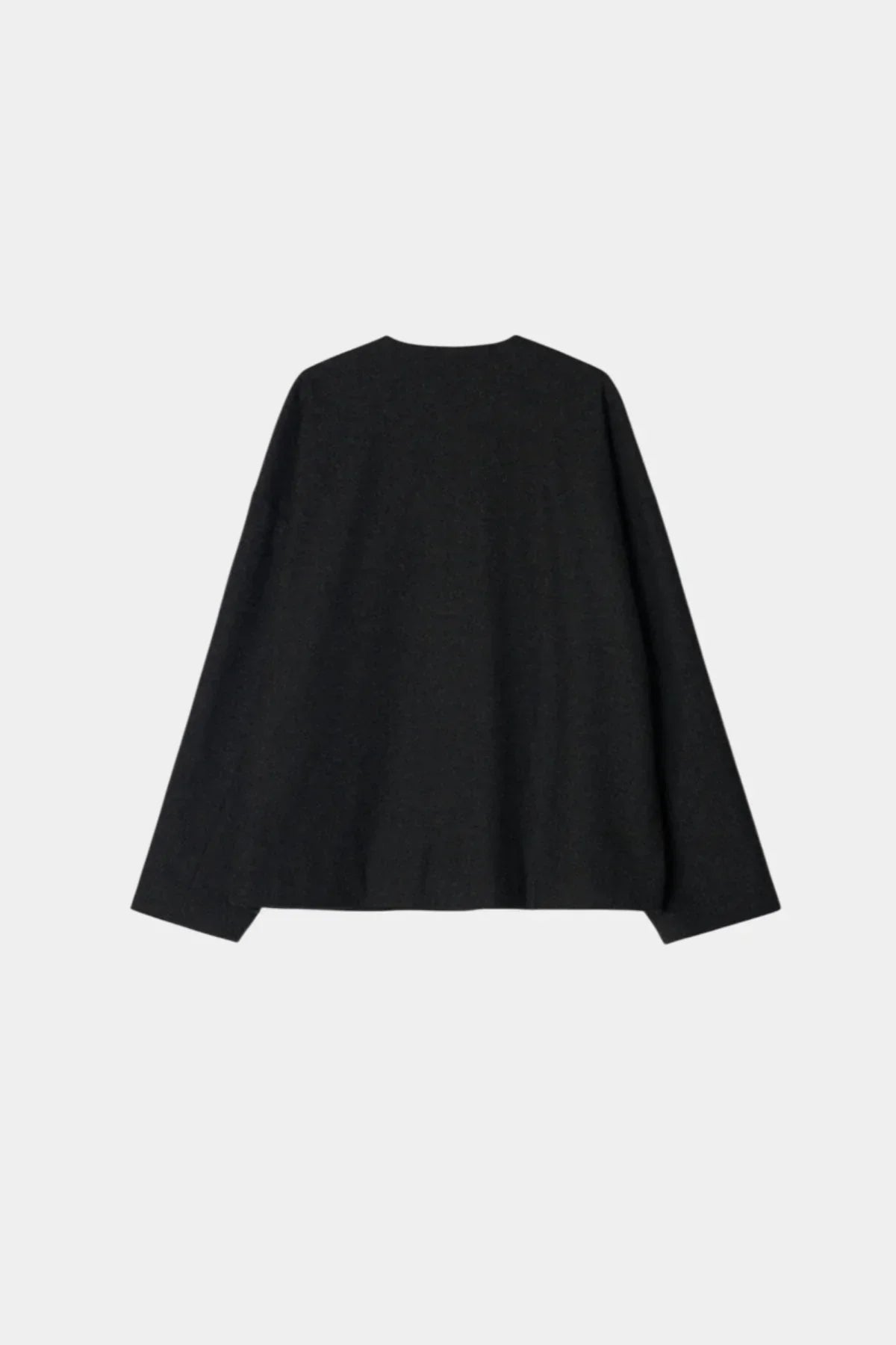 Unisex charcoal wool loop jacket shown from the back on plain light backdrop