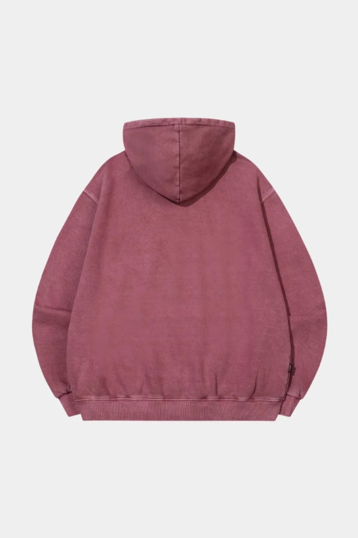 Back view of dusty pink pigment hoodie with hood and ribbed hem and cuffs on plain background