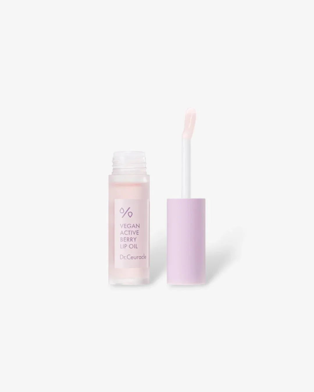 Open tube of vegan active berry lip oil with pink applicator and clear bottle by Dr.Ceuracle