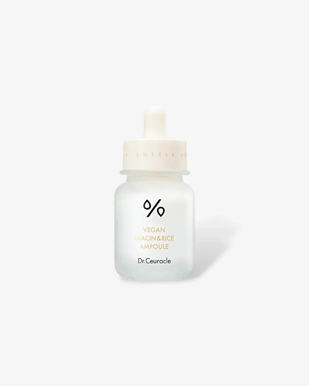 Dr.Ceuracle vegan niacin and rice ampoule serum bottle with dropper on white background