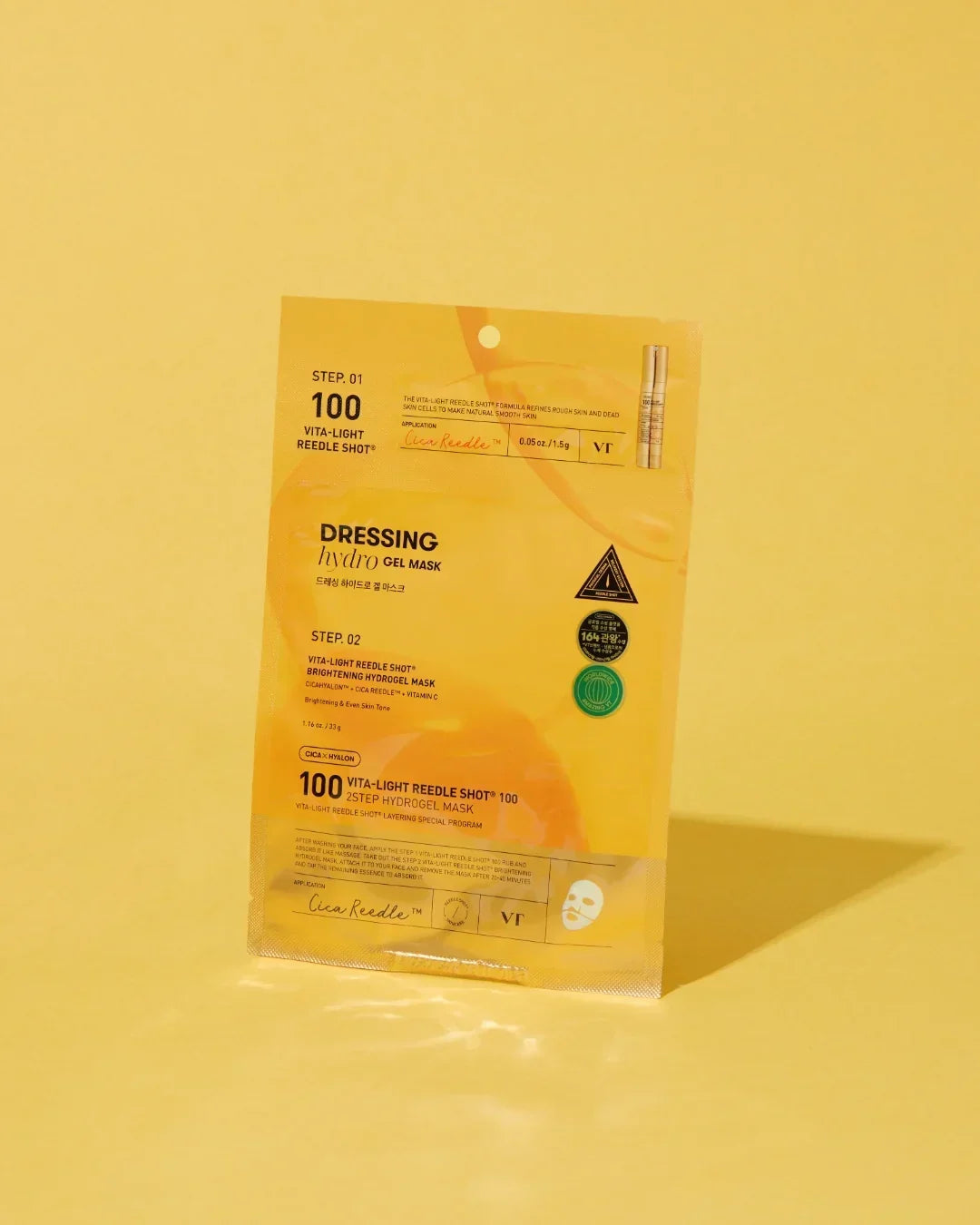 VT Vita-Light Reedle Shot 2-step Hydro Gel Mask brightening skin care product on yellow background