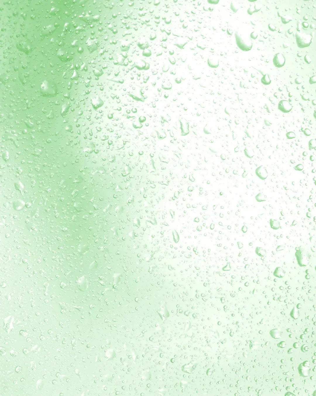Close-up of bamboo mist texture with water droplets on a green surface
