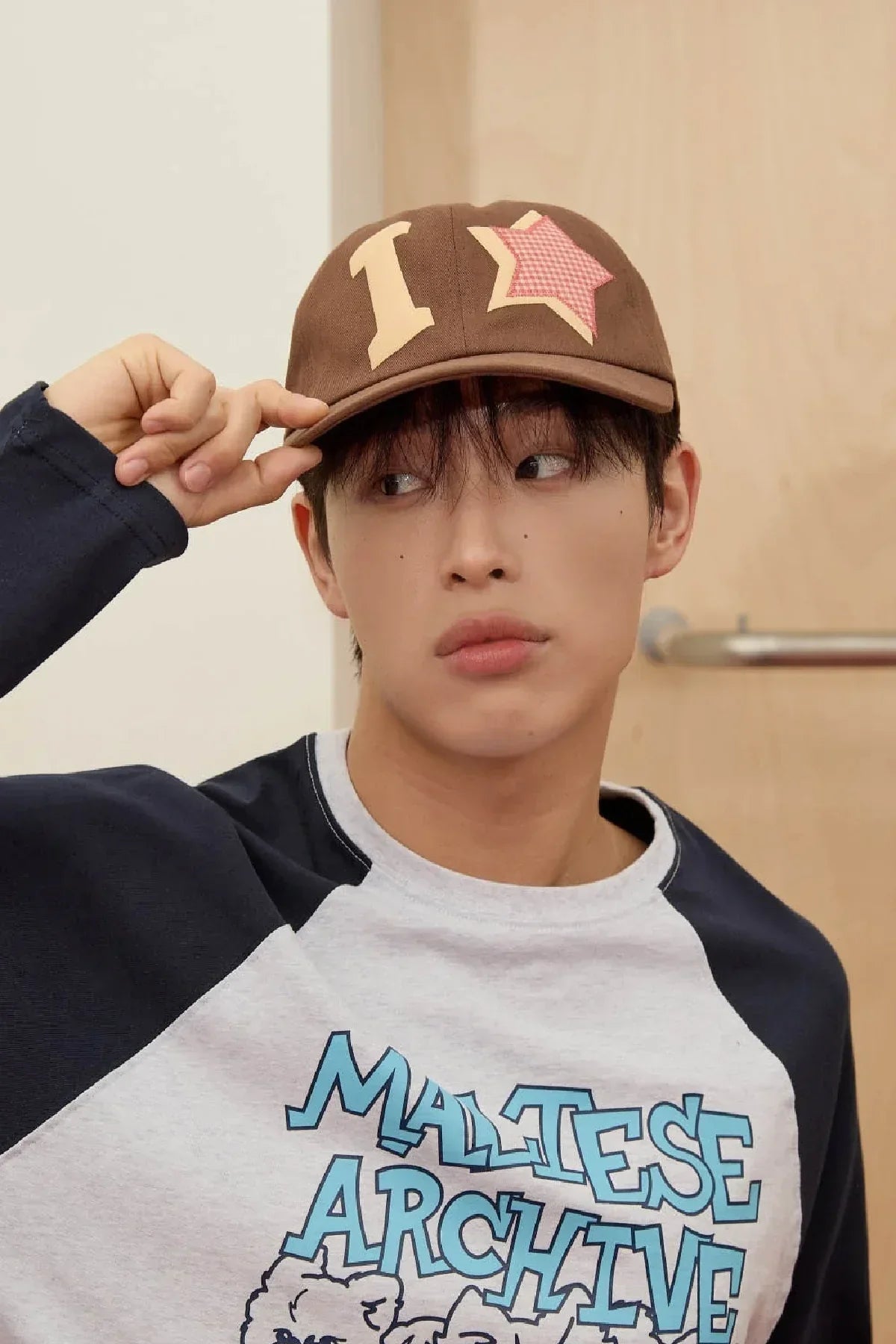 Model wears brown YK check applique ball cap and Maltese Archive shirt, Korean fashion Malkn.