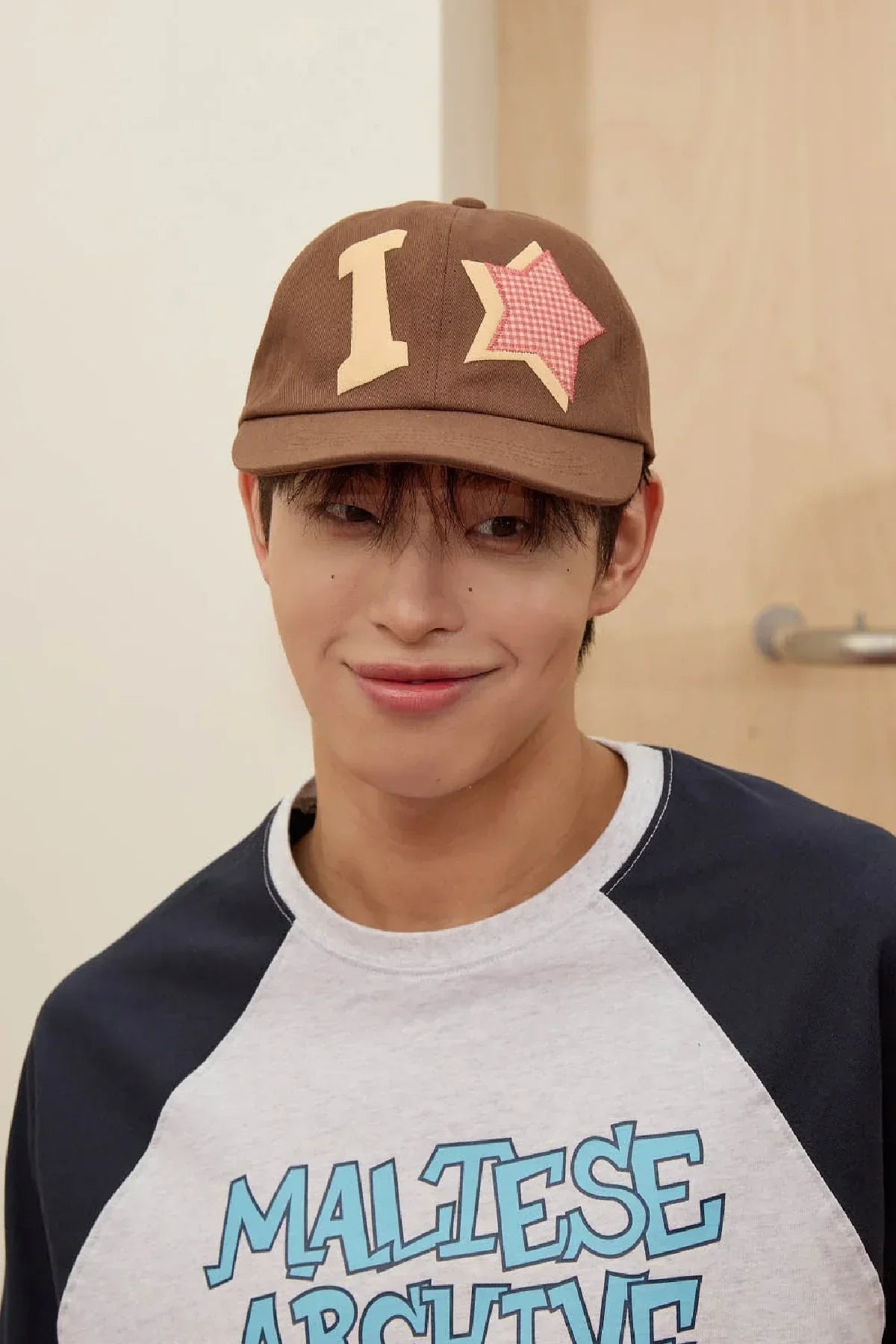 Model wearing brown check applique ball cap and graphic tee, Korean fashion style, Malkn UK