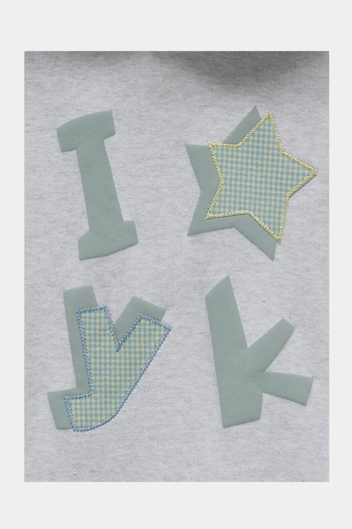 Closeup of I YK check applique on light grey Korean fashion hoodie, Malkn lifestyle collection