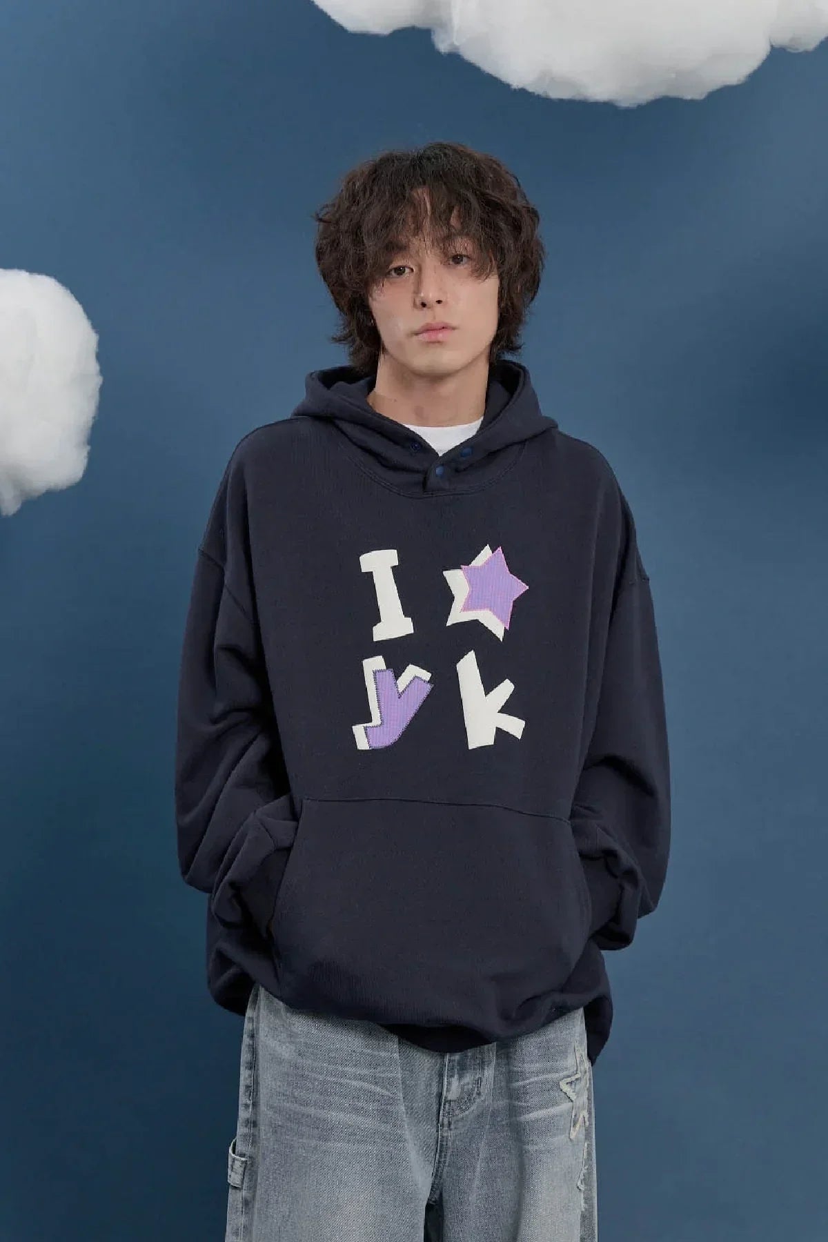 Model wearing navy YK check applique hoodie with graphic text, Korean fashion Malkn style
