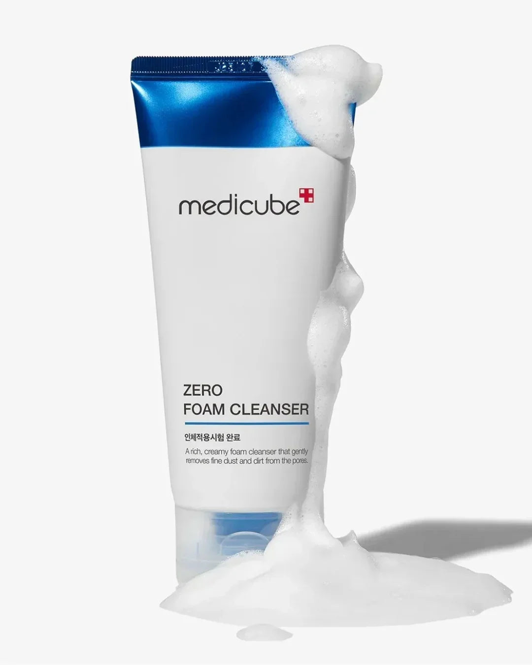 Medicube Zero Foam Cleanser tube with rich white foam overflowing on white background