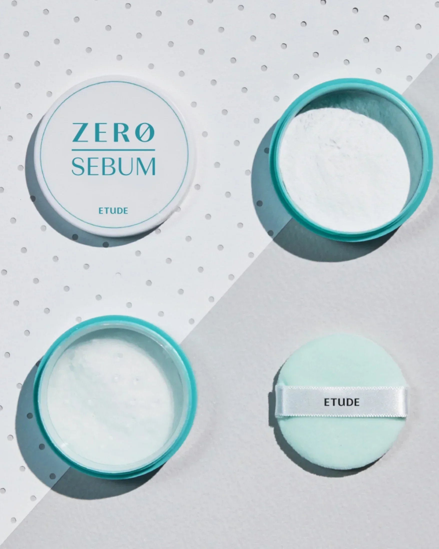 Etude Zero Sebum translucent drying powder open and closed with powder puff on split white background
